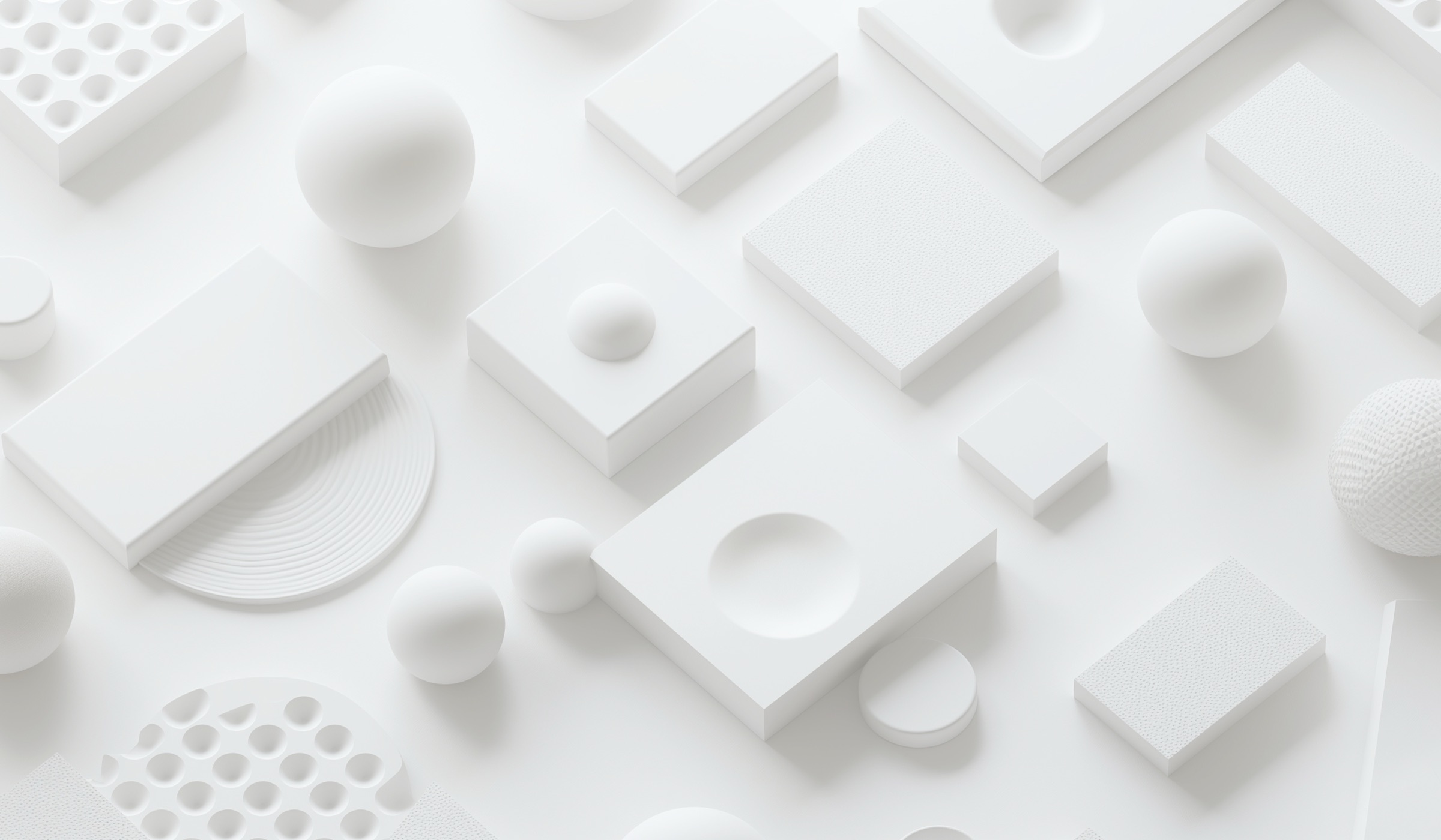 A field of white modular forms, blocks, spheres and textured panels, arranged on a white ground.